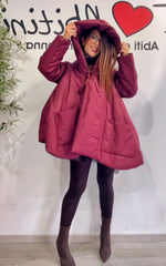 Piumino over con cappuccio